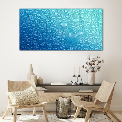 Foto op glas Waterdruppels op een blauwe achtergrond