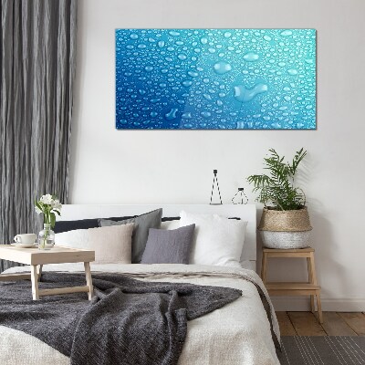 Foto op glas Waterdruppels op een blauwe achtergrond