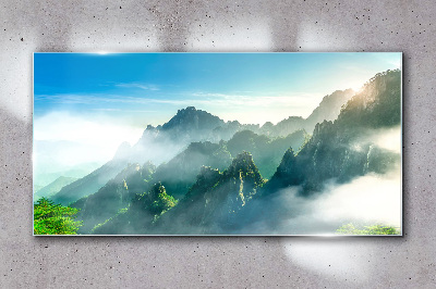 Schilderij op glas Berglandschap op een mistige ochtend