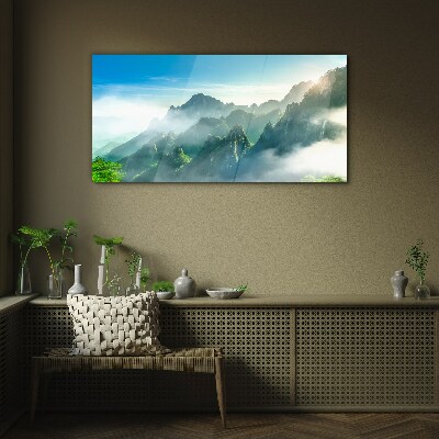 Schilderij op glas Berglandschap op een mistige ochtend
