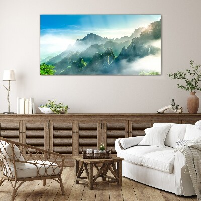 Schilderij op glas Berglandschap op een mistige ochtend