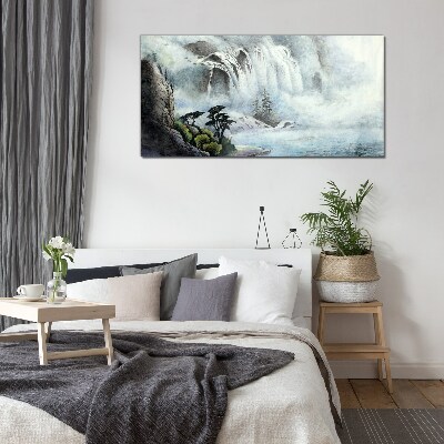 Foto op glas Een waterval in een mystiek landschap