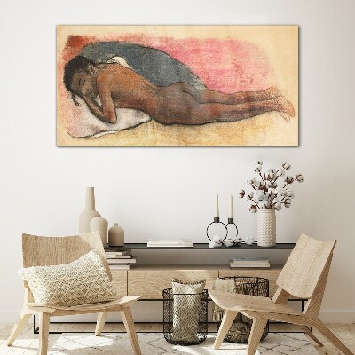 Glas foto Een slapende figuur op een kussen