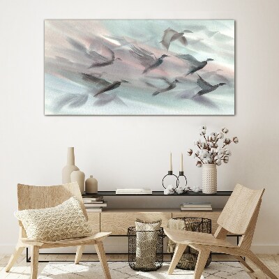 Foto op glas Vlucht van vogels in een pastelkleurige aura