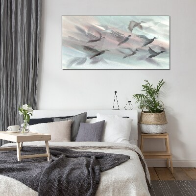 Foto op glas Vlucht van vogels in een pastelkleurige aura