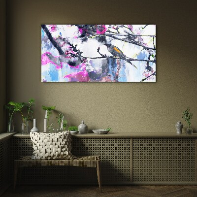 Schilderij op glas Een kleurrijke vogel tegen een achtergrond van bloemen