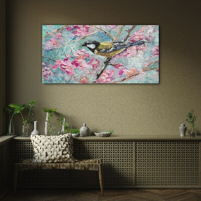 Schilderij op glas Lentevogel zingt op een tak