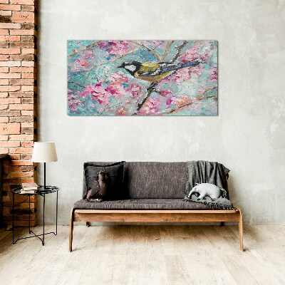 Schilderij op glas Lentevogel zingt op een tak