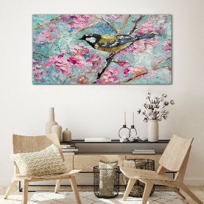 Schilderij op glas Lentevogel zingt op een tak