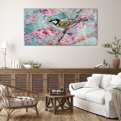 Schilderij op glas Lentevogel zingt op een tak