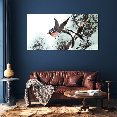 Foto op glas Een vogel in vlucht over de dennen