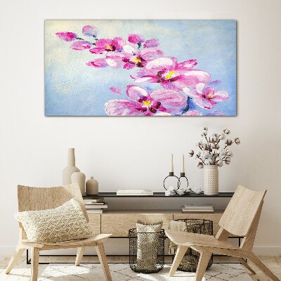 Foto op glas Roze orchideeën op een blauwe achtergrond