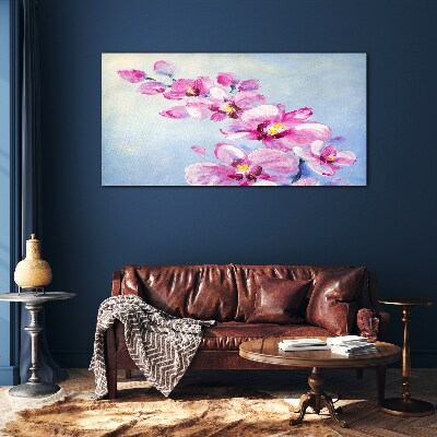 Foto op glas Roze orchideeën op een blauwe achtergrond