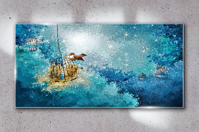 Glas foto Een kooivogel tegen de lucht