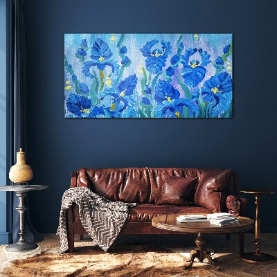 Schilderij op glas Blauwe irissen tegen een blauwe achtergrond