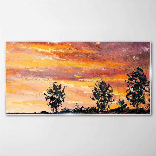 Foto op glas Zonsondergang boven de bomen