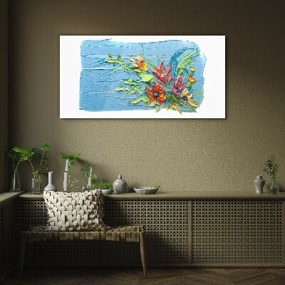 Foto op glas Bloemen op een blauwe achtergrond