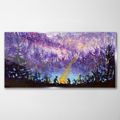 Foto op glas De magie van een avondkampvuur in het bos