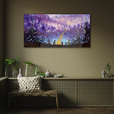 Foto op glas De magie van een avondkampvuur in het bos