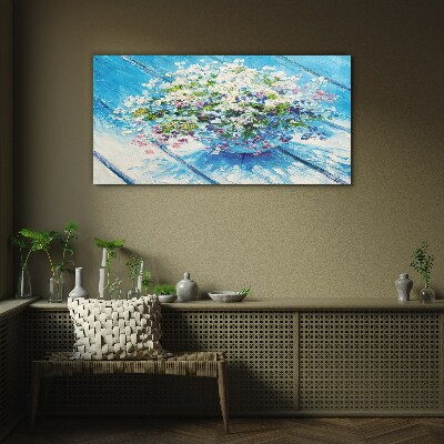 Schilderij op glas Bloemencompositie op een blauwe achtergrond