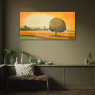 Foto op glas Gouden open plek met een boom