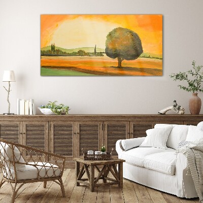 Foto op glas Gouden open plek met een boom