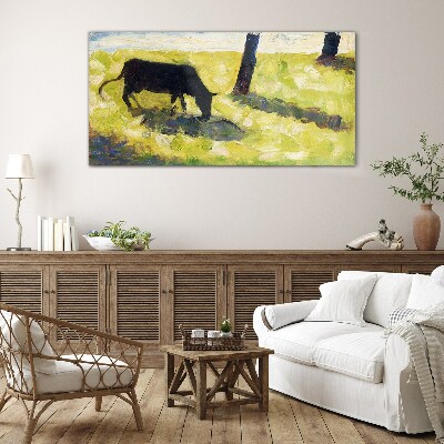 Glas foto Een koe graast in een groen landschap