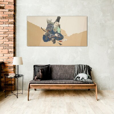 Glas foto Een kunstenaar die in traditionele kledij schrijft