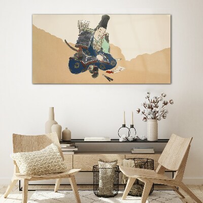 Glas foto Een kunstenaar die in traditionele kledij schrijft