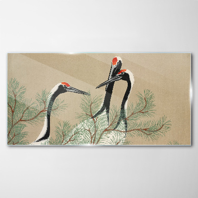 Schilderij op glas Drie kraanvogels tussen de dennentakken