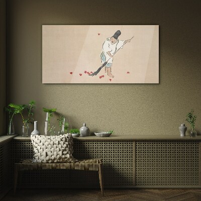 Foto op glas Monnik schoonmaken met bladeren