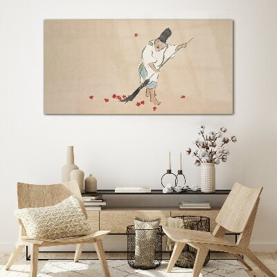 Foto op glas Monnik schoonmaken met bladeren