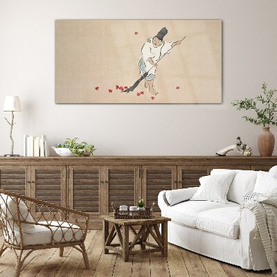 Foto op glas Monnik schoonmaken met bladeren