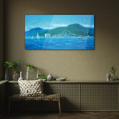 Glas foto Kustlandschap met een pretpark