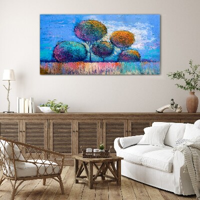 Schilderij op glas Kleurrijke bomen op een blauwe achtergrond