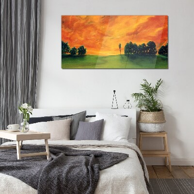 Schilderij op glas Zonsondergang over een groene heuvel