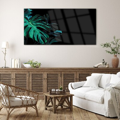 Foto op glas Groene bladeren op een zwarte achtergrond