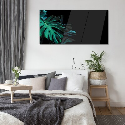 Foto op glas Groene bladeren op een zwarte achtergrond