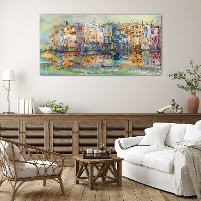 Foto op glas Een kleurrijk stadje aan het water