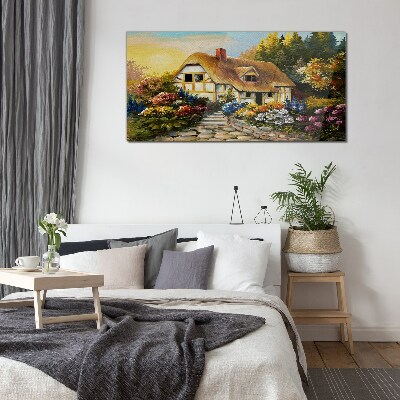 Glas foto Een charmant landhuisje omgeven door bloemen