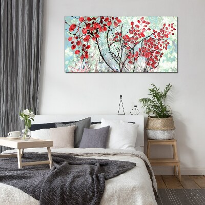 Foto op glas Rode bladeren op een blauwe achtergrond