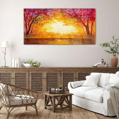Foto op glas Zonsondergang in een kleurrijk bos