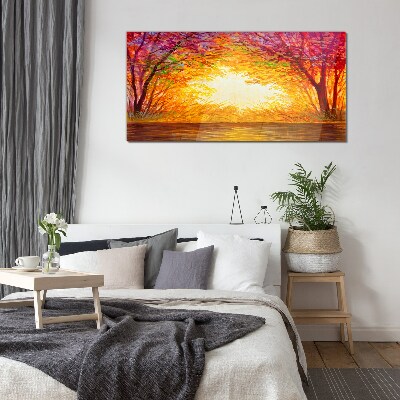 Foto op glas Zonsondergang in een kleurrijk bos