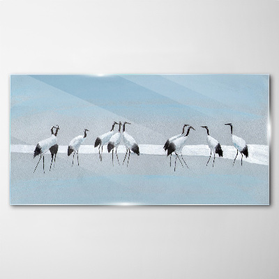 Schilderij op glas Zwermen kraanvogels op een blauwe achtergrond