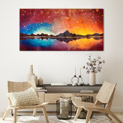 Foto op glas Zonsondergang boven een bergmeer