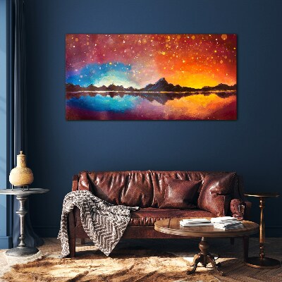 Foto op glas Zonsondergang boven een bergmeer