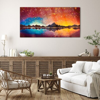 Foto op glas Zonsondergang boven een bergmeer