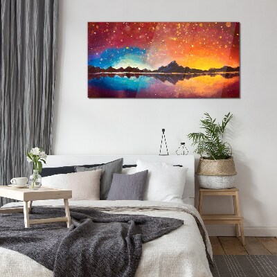 Foto op glas Zonsondergang boven een bergmeer