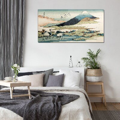 Glas foto Kranen bij een berg