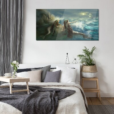 Schilderij op glas Zeemeerminnen aan de kust